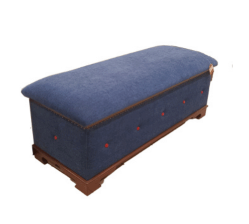 Camilla Fabric-Covered Storage Chest with hinged lift-top lid in a modern bedroom setting.