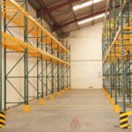 Drive-in racking system designed for high-density pallet storage.