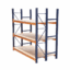 Medium duty metal racking system with blue uprights and orange beams for organized storage