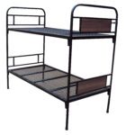 Metal double decker bunk bed with wooden headboard and footboard accents designed for two sleepers.