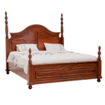 Dark wooden king-size bed with curved headboard and footboard, turned posts, and traditional carved detailing.