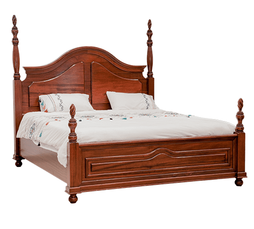 Dark wooden king-size bed with curved headboard and footboard, turned posts, and traditional carved detailing.