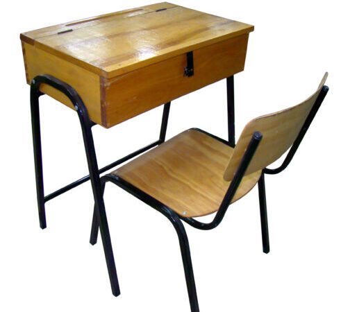School desk and chair set with black metal frame, wooden seat, wooden backrest, and lift-top wooden desk surface.