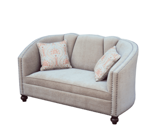 Cream upholstered 2-seater sofa with a curved fluted back, nailhead trim, and turned wooden legs.