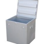 Light grey rectangular metal fuel carrier cage with open hinged lid and side handles.