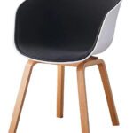Modern plastic chair with a black cushioned seat, white rounded shell, and wooden angled legs.