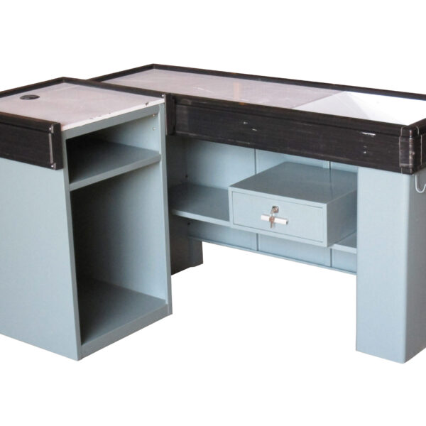 Dark grey L-shaped metal cashier counter with flat work surfaces, black edging, and open shelves.