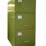 Metal vertical filing cabinet with three drawers and recessed handles.